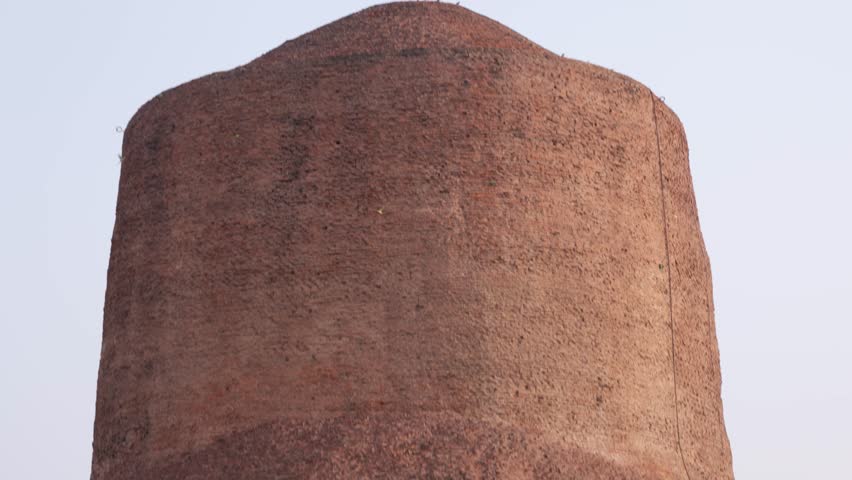 close up view of ancient dhamek stupa ruins at sarnath near varanasi india in sunlight video is taken at Sarnath near Varanasi, India.
