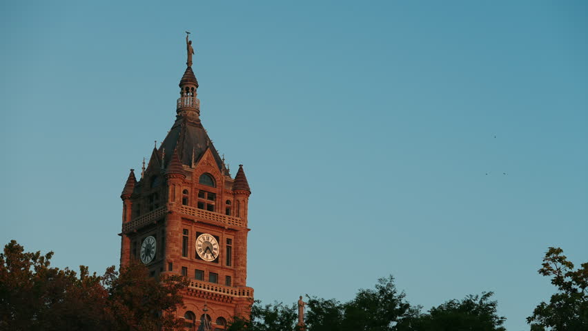 Slat Lake City County Building at sunset surrounded by trees - slow motion 4K