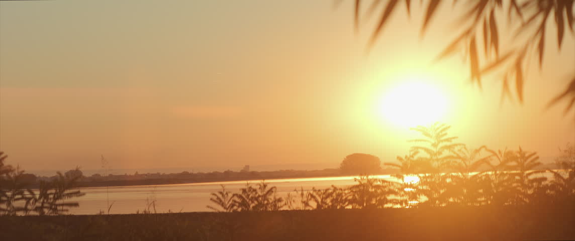 Early morning sun over the Danube river in Serbia 4K anamorphic video