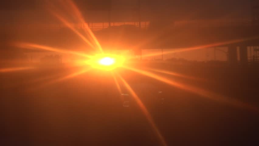 Stockholm, Sweden Traffic on an exit ramp from the E4 highway and the setting sun. 