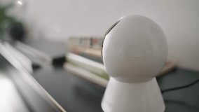 Security camera monitoring an indoor space, providing clear surveillance footage for safety and security, representing monitoring, protection, and crime prevention in a modern setting. home safety - Powered by Shutterstock - Get 15% off with code: PIKWIZARD15