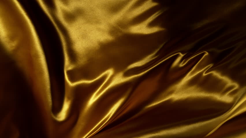 Super Slow Motion of Waving Golden Satin Cloth. Filmed on High Speed Cinema Camera, 1000 fps. Isolated on White Background.