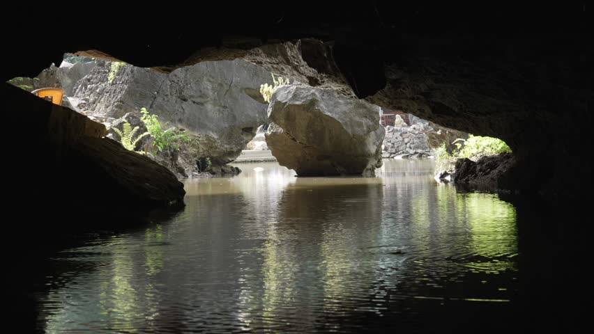 Cave boat tour travel Trang An Ninh Binh Vietnam UNESCO World Heritage site