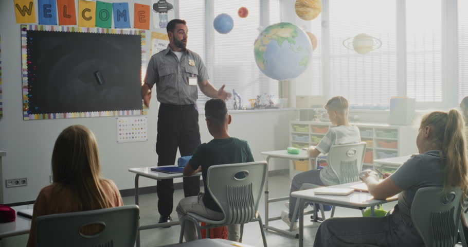 TSA Security Officer Explaining Safety Rules to Young Students at Elementary School Classroom. Children Asking Questions, Listening to Police Worker Guidance About Knowledge of Law and Responsibility.