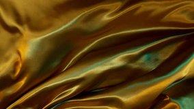 Super Slow Motion of Waving Golden Satin Cloth. Filmed on High Speed Cinema Camera, 1000 fps. Isolated on White Background. - Powered by Shutterstock - Get 15% off with code: PIKWIZARD15