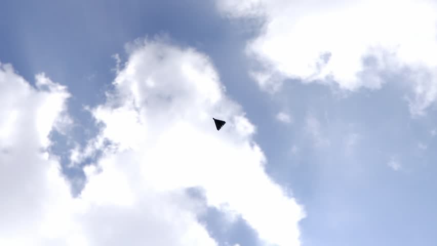  View of a kamikaze drone flying against the sky, UAV used in modern conflict, Russia Ukraine war Military Drone Kamikaze Shahed 136 Flight in the Sky Close-up 3d Animation. Battle UAV Geranium Flying