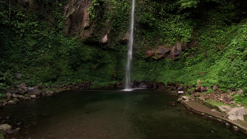 Drone Shot of Katibawasan Falls, Tourist Attraction on Camiguin Island, Philippines