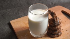 chocolate chip cookies with milk glass, Sweet temptation  - Powered by Shutterstock - Get 15% off with code: PIKWIZARD15