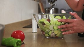 Preparing Fresh Salad in a Kitchen with Healthy Vegetables in a Glass Bowl - Powered by Shutterstock - Get 15% off with code: PIKWIZARD15