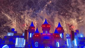 Crowd dancing and enjoying DJ music, lights, and fireworks at night during Medusa Festival in Valencia, Spain. Vibrant celebration of electronic music and youth culture - Powered by Shutterstock - Get 15% off with code: PIKWIZARD15