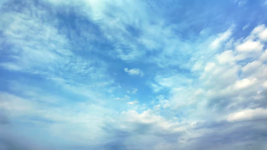 Dynamic Timelapse Clouds Floating Over Blue Horizon