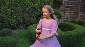 Child hugging wooden nutcracker toy in garden - Powered by Shutterstock - Get 15% off with code: PIKWIZARD15