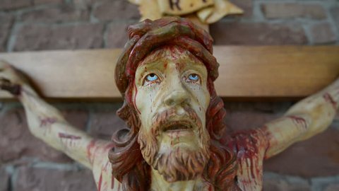 A very bloody and scary jesus on the cross - super close. 10930 

