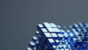 Reflective blue cubes animate in a dynamic grid pattern against a muted grey backdrop. Visualizing data processing, digital networks, and technological advancement with a futuristic aesthetic. - Powered by Shutterstock - Get 15% off with code: PIKWIZARD15