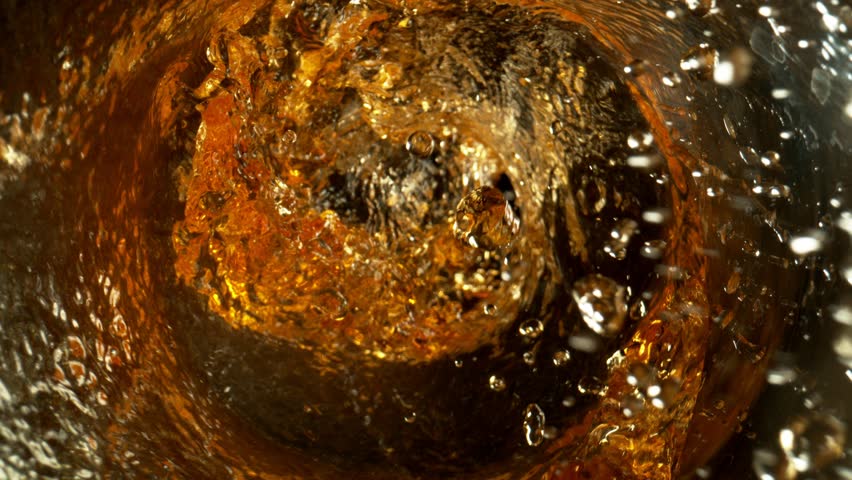 Super Slow Motion Shot of Whisky Vortex at 1000 fps