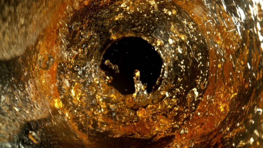 Super Slow Motion Shot of Whisky Vortex at 1000 fps