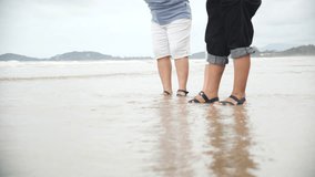 Elderly senior women enjoy summer activity on beach shore with tourism travel by sea for relaxation and fun near ocean water in casual clothes and hats - Powered by Shutterstock - Get 15% off with code: PIKWIZARD15