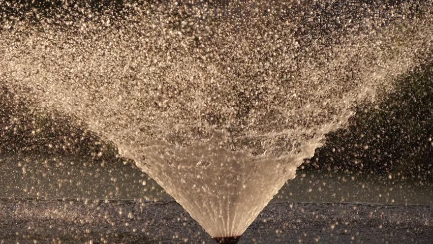Fountain on the lake close up slow motion