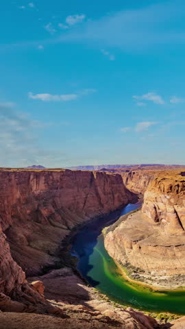 
Beautiful time lapse of Horseshoe Bend on the Colorado river on a sunny day. The most iconic tourist attraction of the Grand Canyon in Page, Arizona, USA.