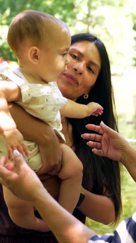 Grandmother, mother, and daughter enjoying quality time together in a park, creating lasting memories