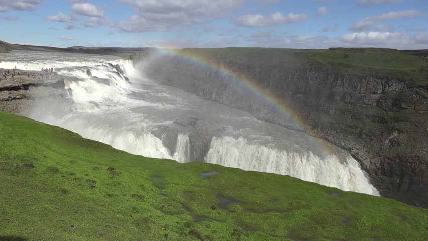 View of Mývatn Lake nestled within Iceland’s volcanic landscape, featuring calm waters, distant hills, and open terrain that highlight the dramatic yet peaceful scenery of North Iceland.