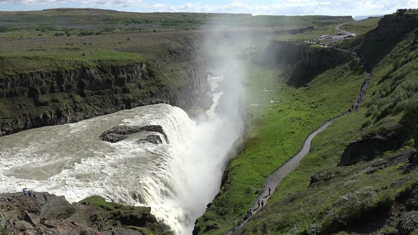Wide, panoramic view of Mývatn Lake set within northern Iceland’s volcanic landscape. The reflective water, distant hills, and open terrain capture the serene and expansive character of the region.