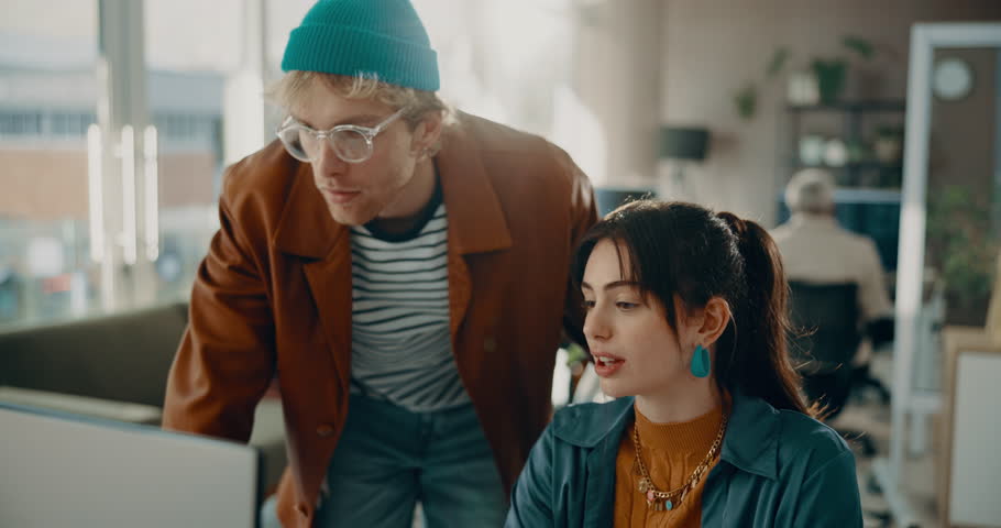 Creative, people or computer with advice in office for story headline, article review or fast checking. Teamwork, journalist and help intern with news report or proofreading blog at publishing agency