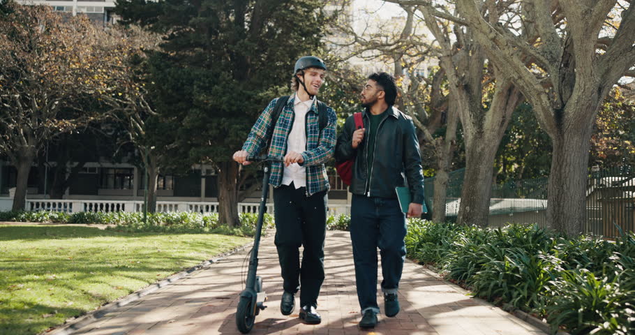 Friends walking, students and fist bump at university for support, success or thank you with team. Happy men, college and hand gesture for education achievement, learning or goal with scooter outdoor