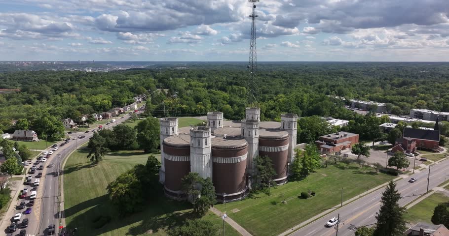 Aerial view of the historic Tower at the old waterworks shows its unique architecture against the backdrop of lush greenery, Cincinnati, OH, United States.