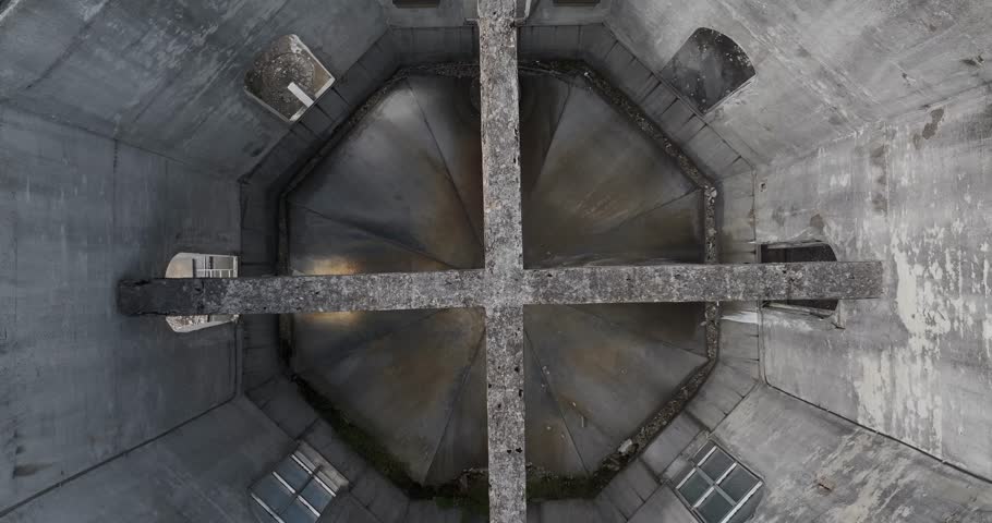 Aerial view of an octagonal building with a cross structure on the roof, showcasing textures and tones, Cincinnati, OH, United States.