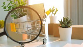 Using a magnifying glass to inspect products in a shopping cart represents the importance of quality checks in e-commerce. Highlights consumer awareness, informed choices, trust, and transparency.
 - Powered by Shutterstock - Get 15% off with code: PIKWIZARD15
