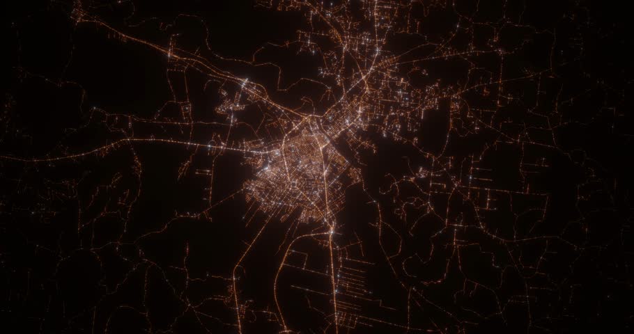 Alexandria (Louisiana, USA) aerial view at night. Top view on city from space. Camera is zooming in, rotating clockwise