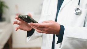 Diverse Medical Professional Using a Smartphone for Digital Healthcare and Patient Consultation - Powered by Shutterstock - Get 15% off with code: PIKWIZARD15
