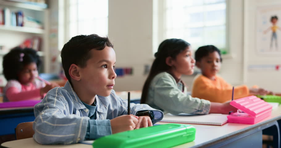 Classroom, writing and children with books at school for education, child development or lesson. Academy, students and kids with pencil for learning literacy skills, knowledge and studying for growth
