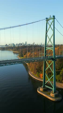 Aerial view of Lions Gate Bridge and Stanley Park at dawn. Canada