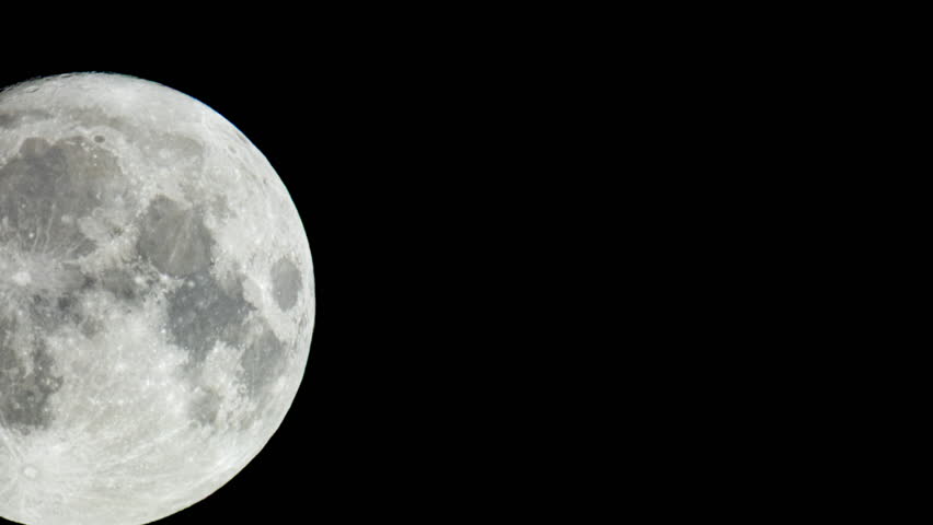 Time Lapse Of Big Full Moon Rising Or Moving Through Warm Air In The Night Sky At Summer. Scientific Concept