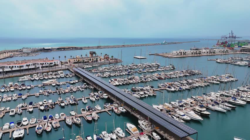 Aerial view of the moorings of Marina Alicante, Spain. High quality 4k footage