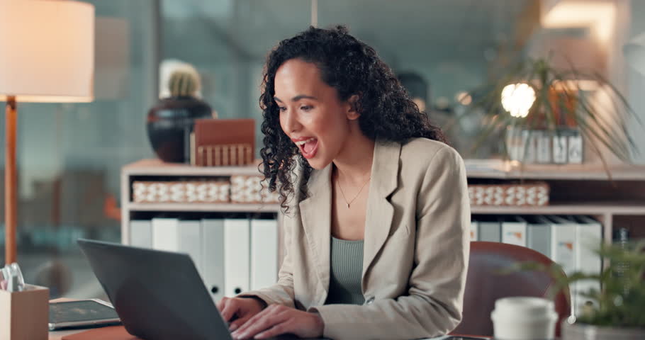 Happy, celebration and woman in office, laptop and investment deal with promotion, excited or bonus. Person, financial agency or consultant with pc, profit growth or achievement with success or smile