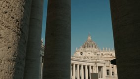 View of St Peters Square statues framed between Vatican colonnade columns. High quality 4k footage - Powered by Shutterstock - Get 15% off with code: PIKWIZARD15