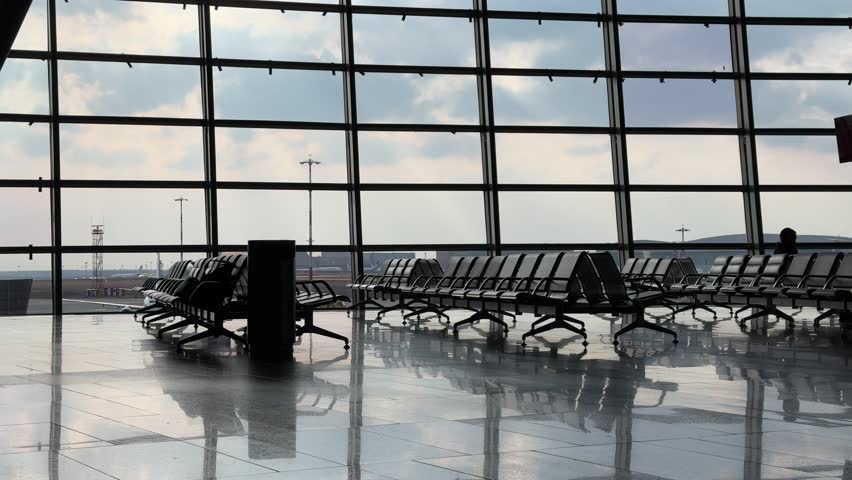 Empty Departure Hall with Vacant Seats at the Airport