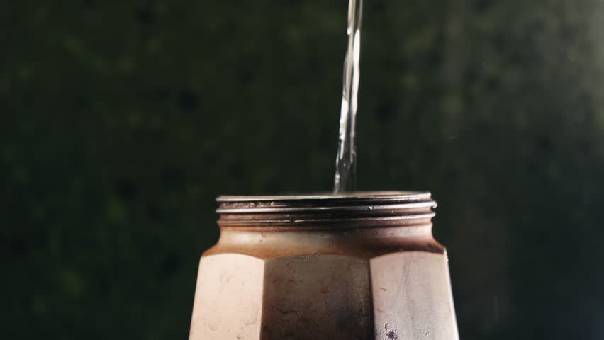 Italian metallic coffee geyser maker. Mocha coffee pot for making espresso coffee