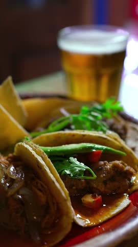 A variety of delicious traditional Mexican tacos on a plate