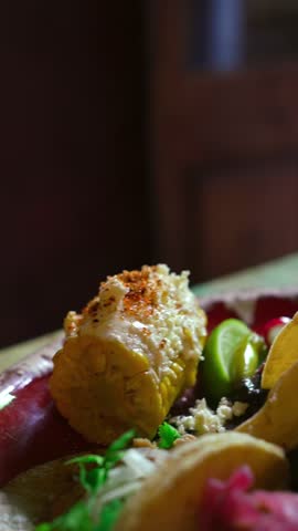 A variety of delicious traditional Mexican tacos on a plate