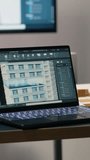 Vertical Video Quiet empty office space in a modern real estate development firm shows 3D models urban layout on table, architecture design tools used in housing and redevelopment planning. Master - Powered by Shutterstock - Get 15% off with code: PIKWIZARD15
