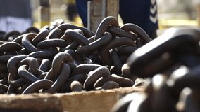 Slow motion footage of athletes grabbing heavy rusty industrial chains during intense workout training with dramatic lighting and powerful movements - Powered by Shutterstock - Get 15% off with code: PIKWIZARD15