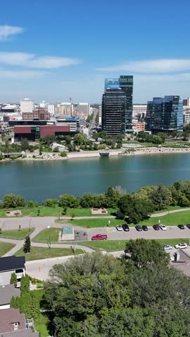 Stunning 4K aerial drone footage of downtown Saskatoon with sweeping views of the South Saskatchewan River.