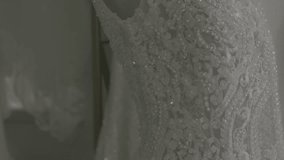 A perfect visual for bridal blogs, fashion designers, or wedding planners. The footage captures the timeless beauty and elegance of a classic wedding dress. - Powered by Shutterstock - Get 15% off with code: PIKWIZARD15