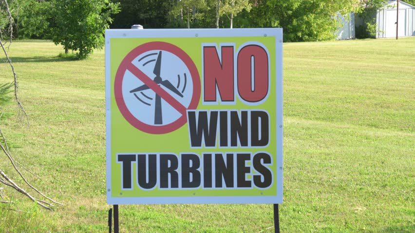 No wind turbines sign. Protesting wind turbines on farm land.
