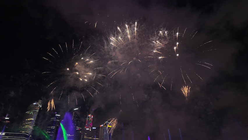 Singapore Marina Bay Sands Skyline at Night with Fireworks and Cityscape