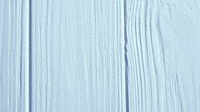 Light blue painted wooden boards forming a vertical striped pattern, ideal for backgrounds video textures and 4k - Powered by Shutterstock - Get 15% off with code: PIKWIZARD15